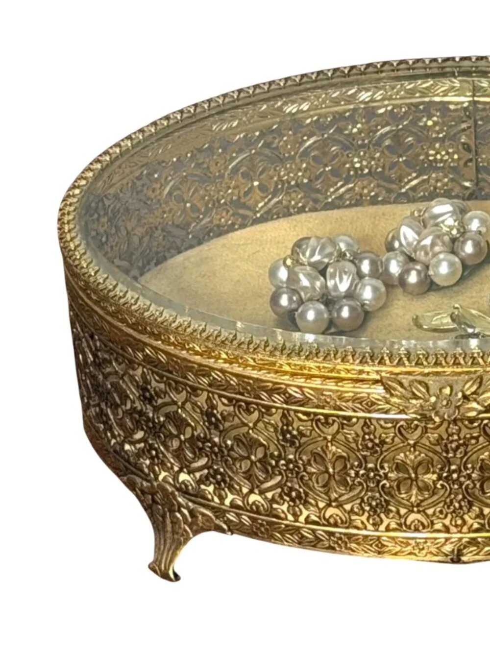 Vintage Hollywood Regency style brass filigree jewelry box with beveled glass to